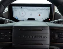 Right hand drive 2026 Hummer EV SUV 3X in Graphite Blue Metallic from Autogroup International - right hand side steering wheel