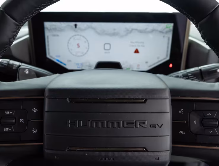 Right hand drive 2026 Hummer EV SUV 3X in Graphite Blue Metallic from Autogroup International - right hand side steering wheel