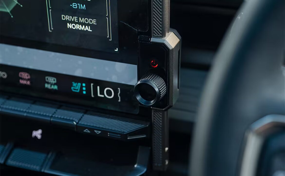 Right hand drive 2026 Hummer EV SUV 3X in Graphite Blue Metallic from Autogroup International - volume control knob relocated