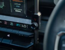Right hand drive 2026 Hummer EV SUV 3X in Graphite Blue Metallic from Autogroup International - volume control knob relocated
