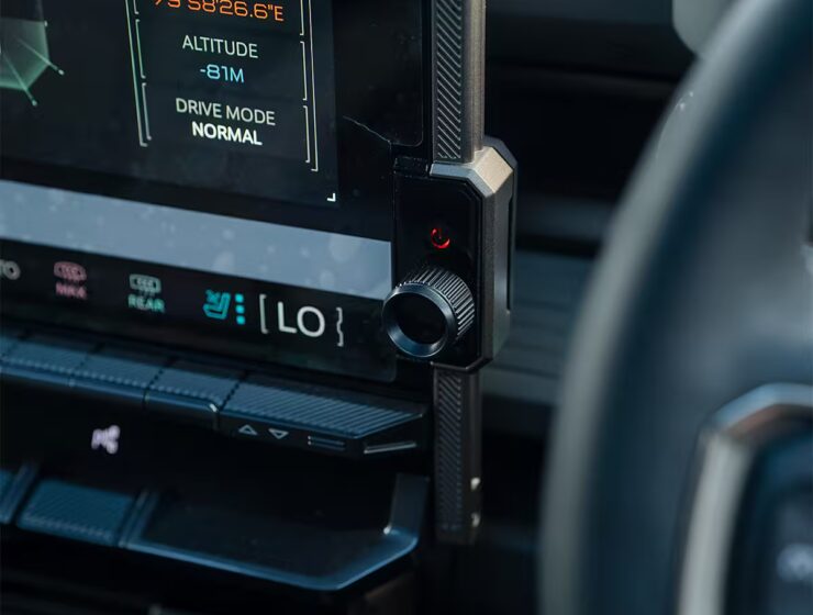 Right hand drive 2026 Hummer EV SUV 3X in Graphite Blue Metallic from Autogroup International - volume control knob relocated