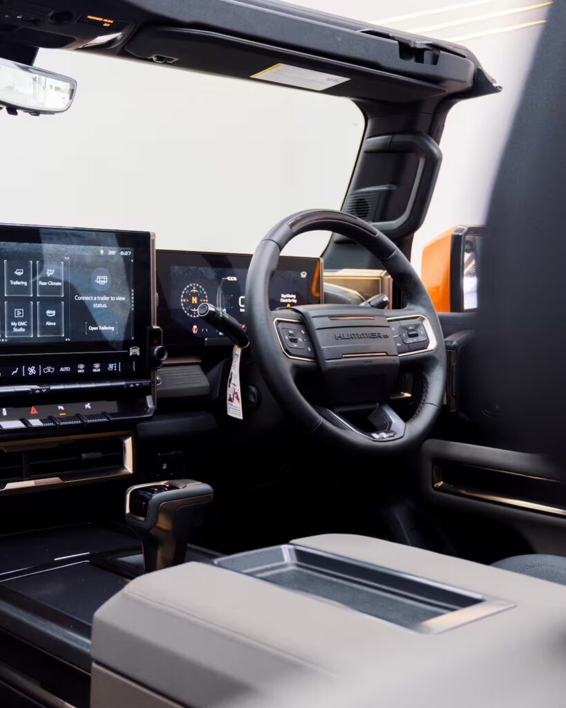 Interior photo of the right hand drive dashboard of the Hummer EV SUV from Autogroup International - ready for Australia
