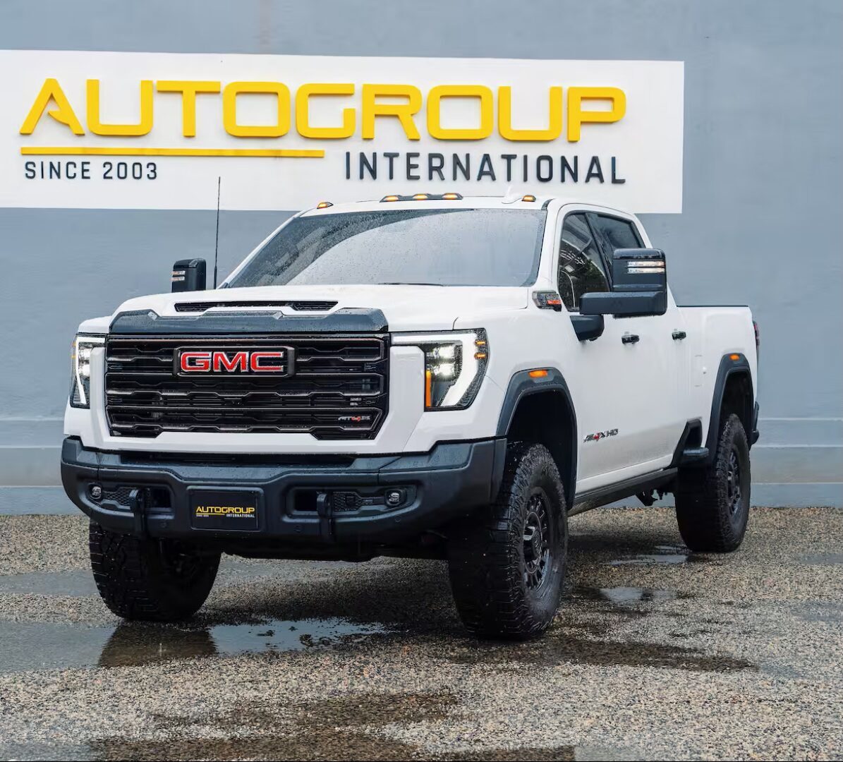 right hand drive 2025 GMC Sierra 2500 HD At4X AEV Special Edition from Autogroup International - white exterior