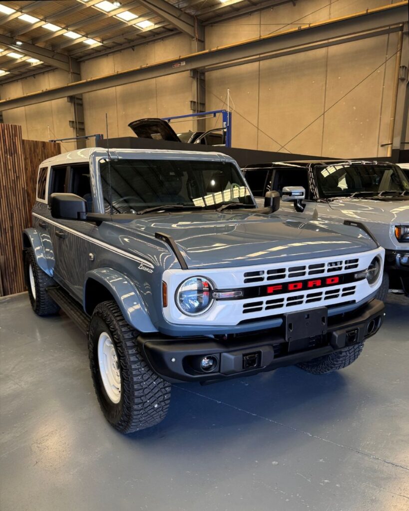 Inside Autogroup International in Pakenham - a right hand driev Dodge Challenger, Ford Bronco, Hummer EV, Silverado EV and GMC Sierra pikcup truck (Large)