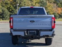right hand drive 2026 ford super duty f 350 lariat tremor from autogroup international (rear end view) in australia