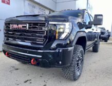 right hand drive 2026 gmc sierra 2500 hd at4x from autogroup international (front qtr) in australia