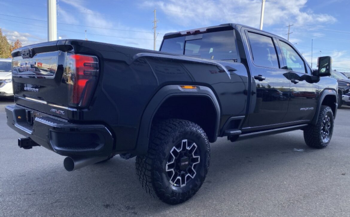 right hand drive 2026 gmc sierra 2500 hd at4x from autogroup international (rear qtr) in australia
